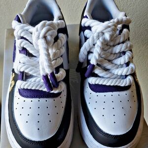 Nike Men's Sneakers in Black, White, and Gold